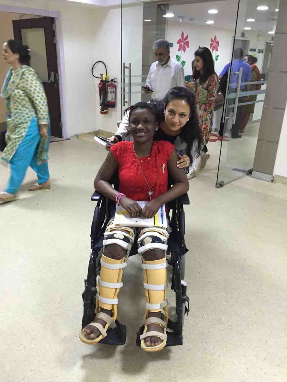 Patient with doctor after successful treatment in India