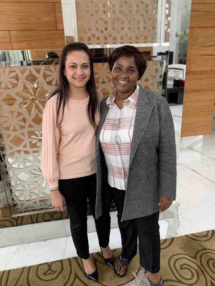 Patient with doctor after successful treatment in India