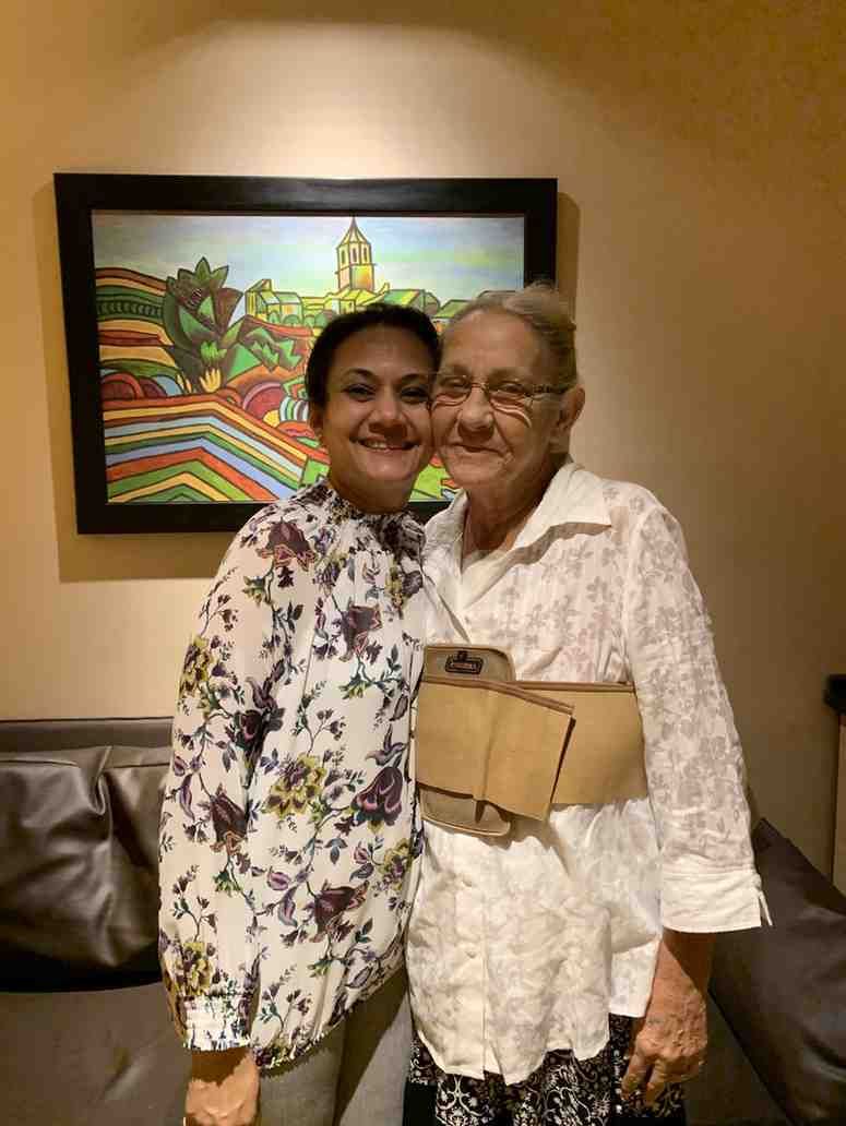 Patient with doctor after successful treatment in India
