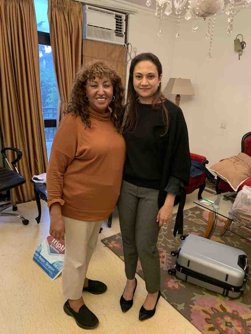 Patient with doctor after successful treatment in India