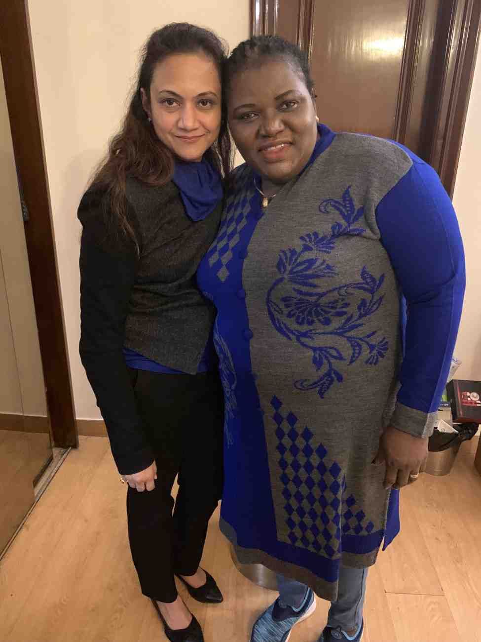 Patient with doctor after successful treatment in India