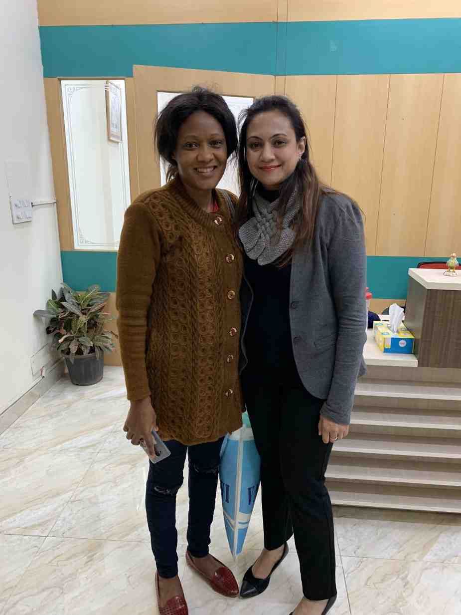 Patient with doctor after successful treatment in India