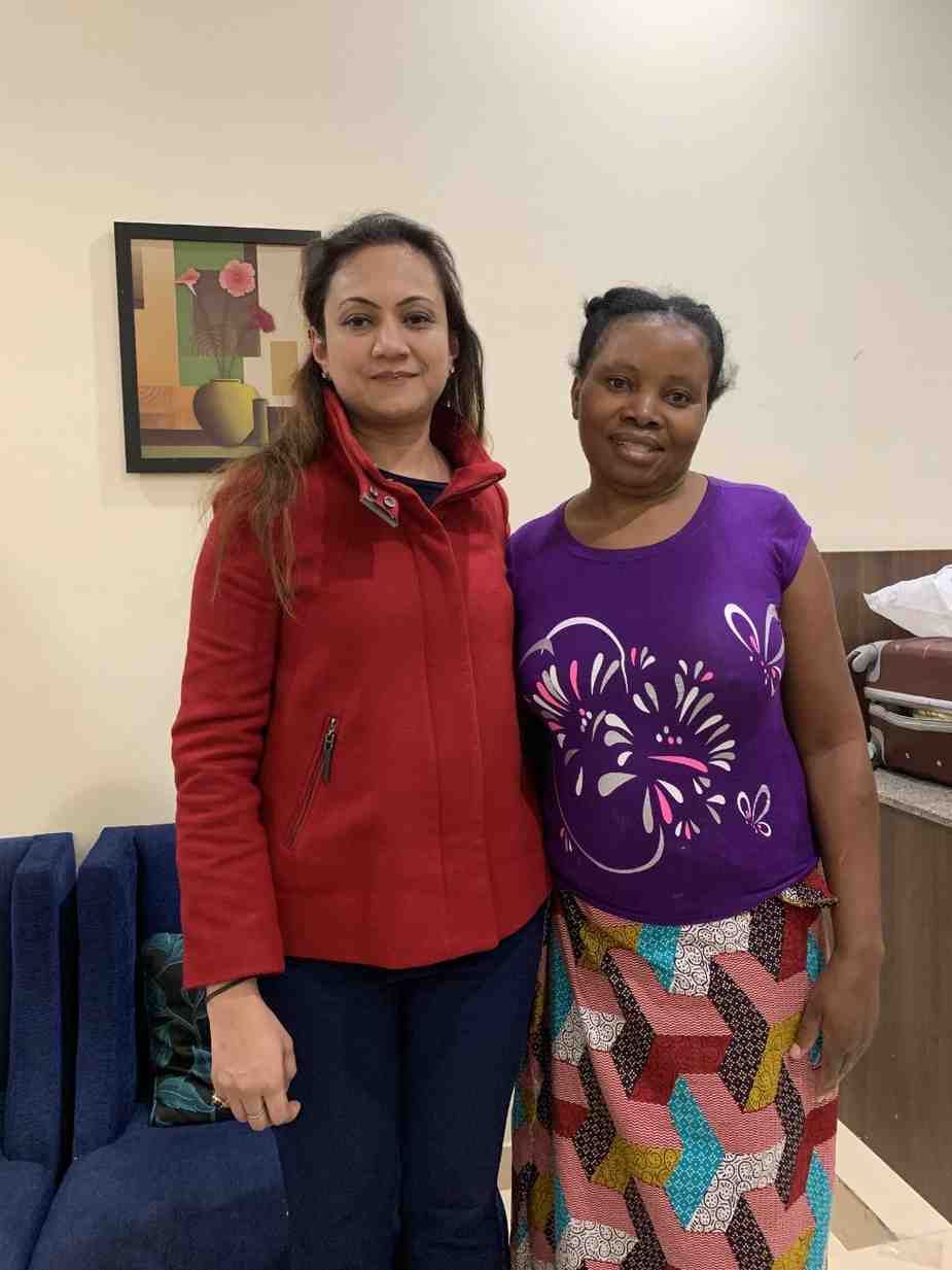 Patient with doctor after successful treatment in India
