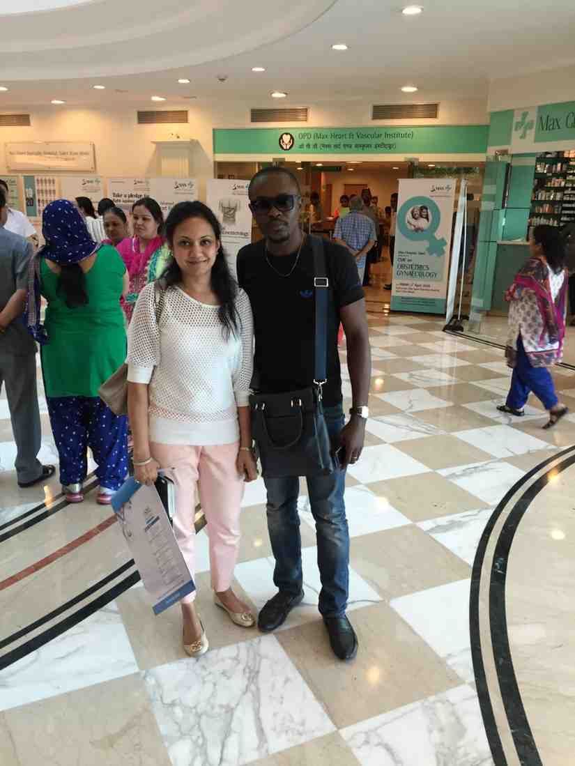 Patient with doctor after successful treatment in India