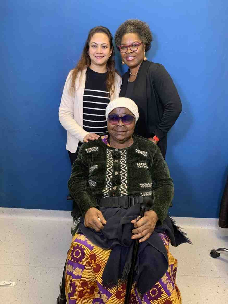 Patient with doctor after successful treatment in India