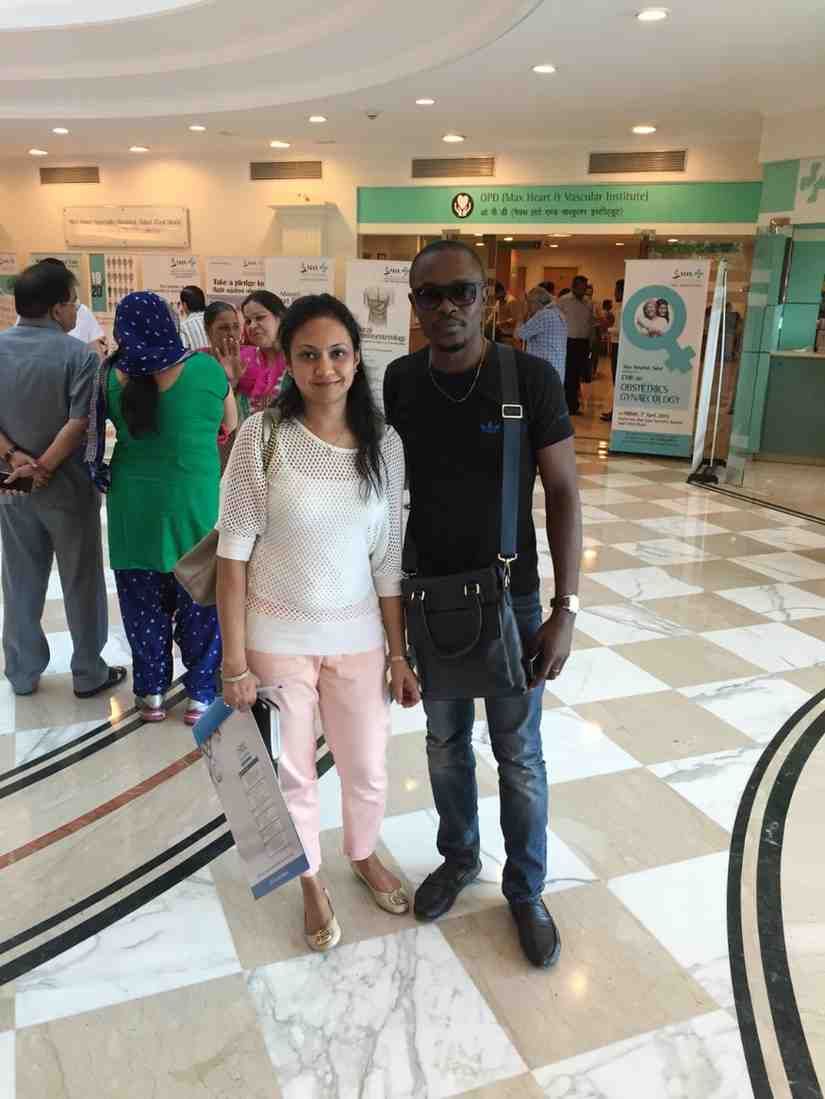Patient with doctor after successful treatment in India