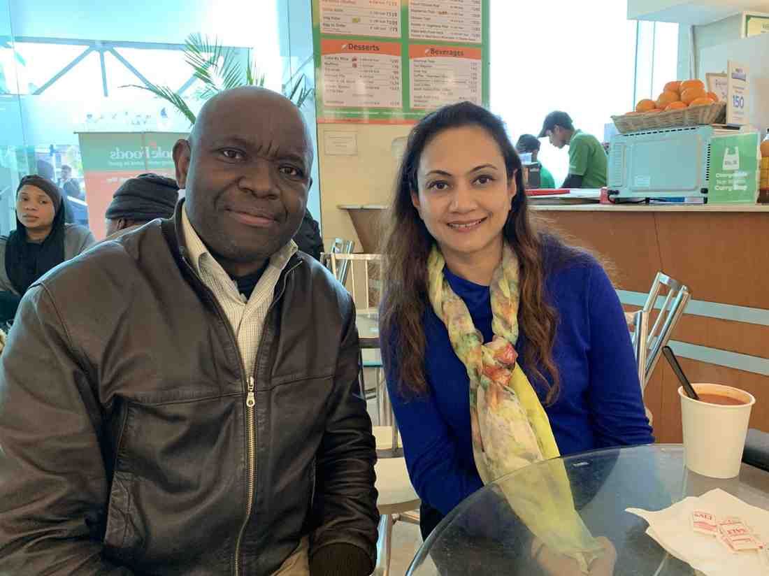 Patient with doctor after successful treatment in India