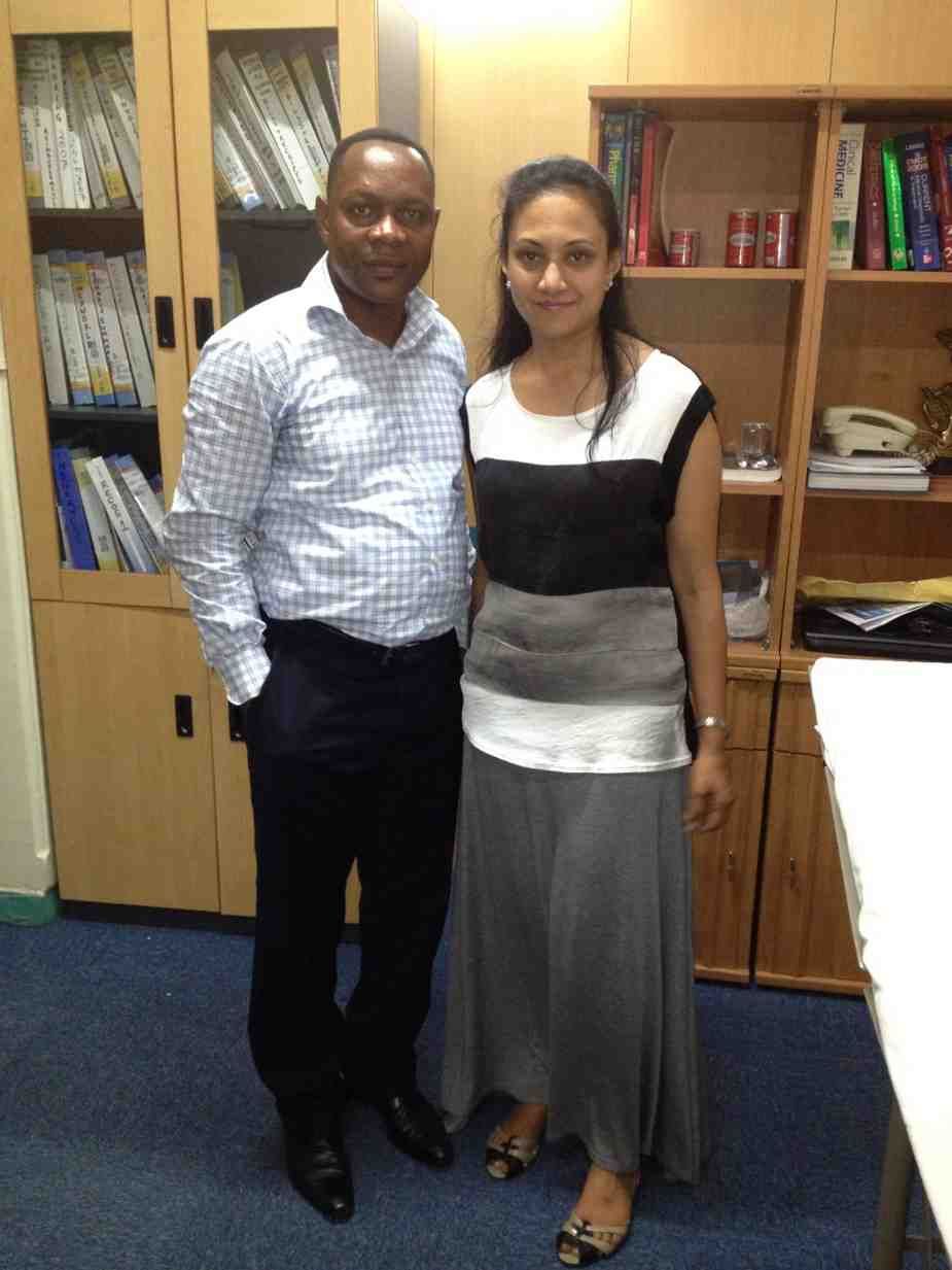 Patient with doctor after successful treatment in India
