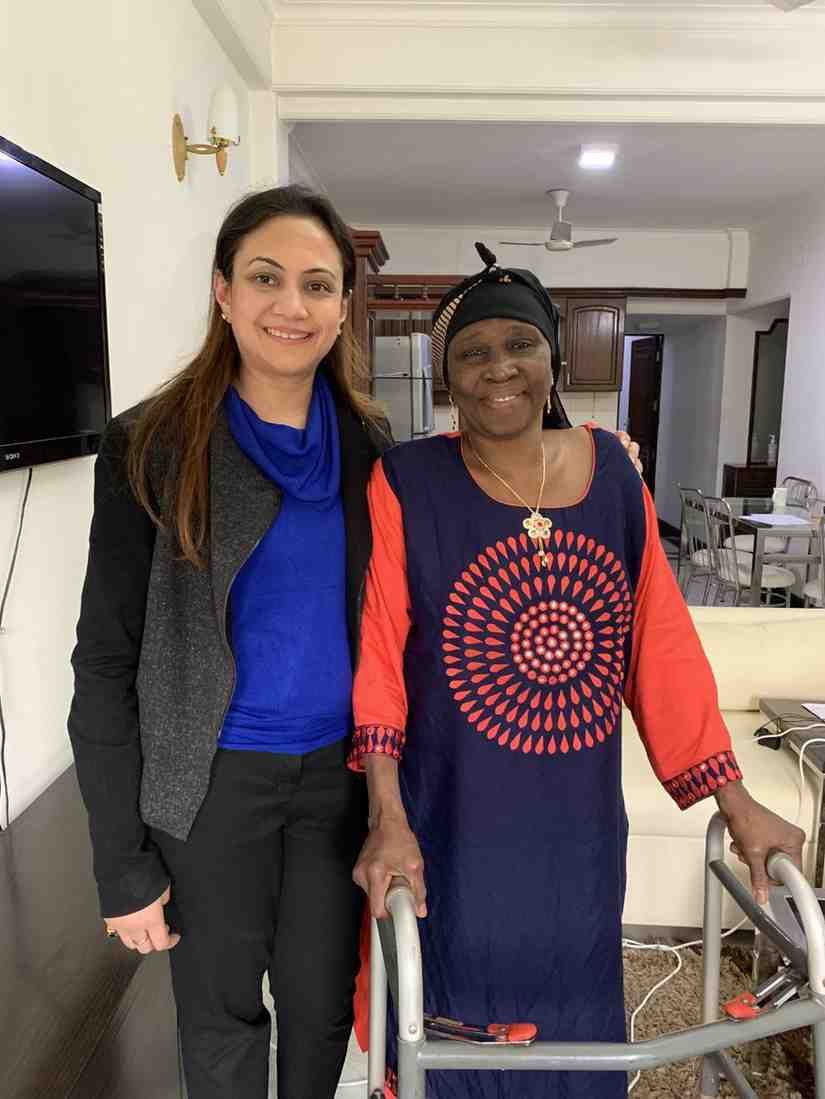 Patient with doctor after successful treatment in India