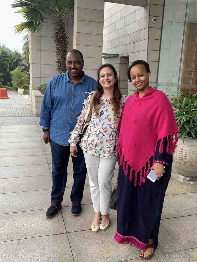 Patient with doctor after successful treatment in India