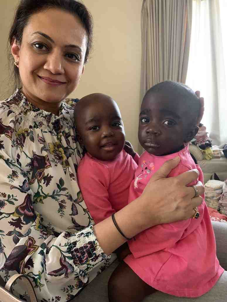 Patient with doctor after successful treatment in India