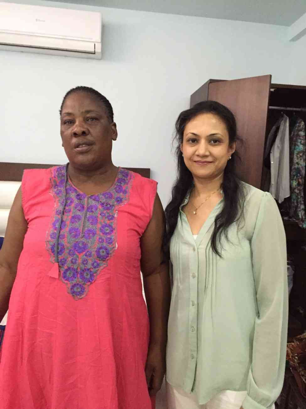 Patient with doctor after successful treatment in India