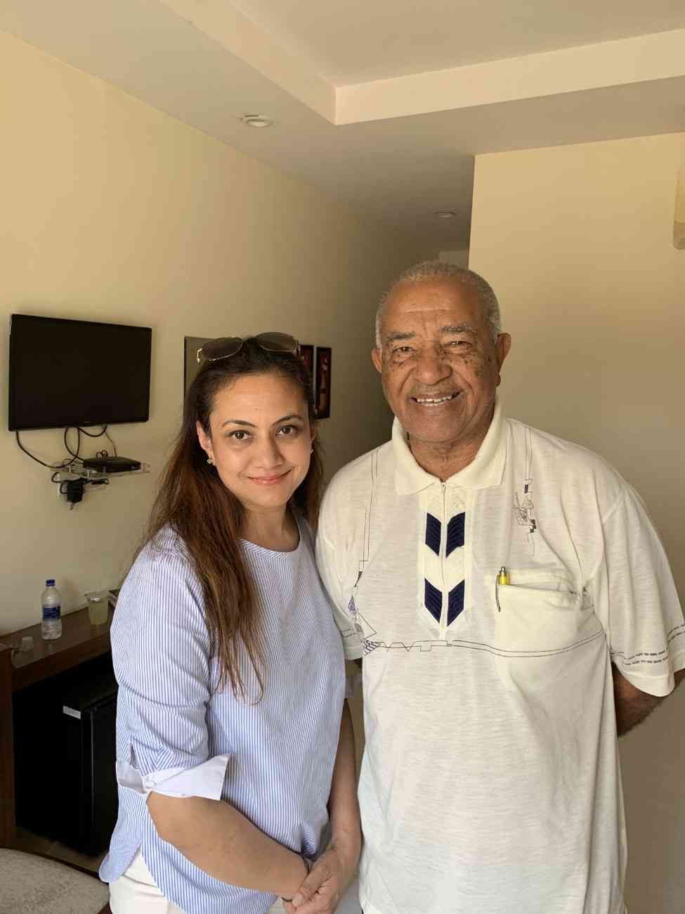 Patient with doctor after successful treatment in India