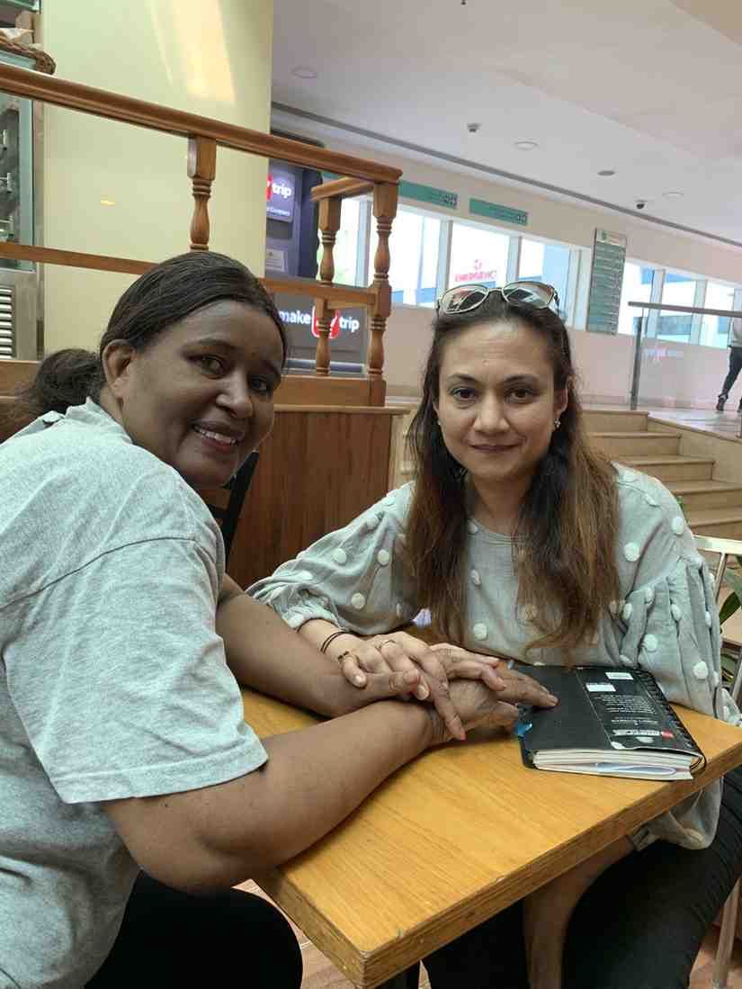 Patient with doctor after successful treatment in India
