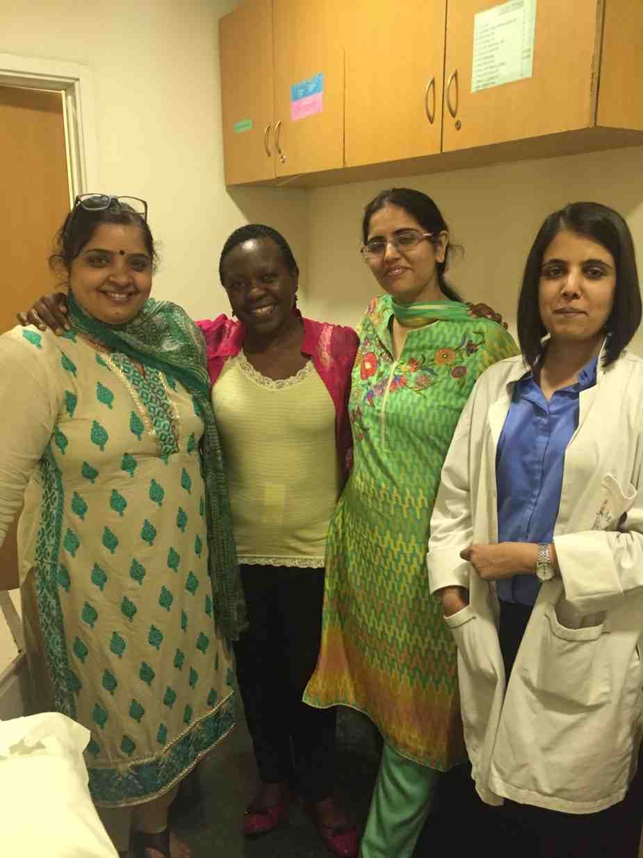 Patient with doctor after successful treatment in India