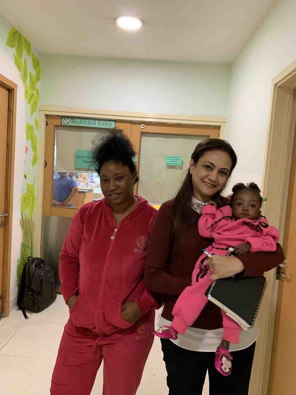 Patient with doctor after successful treatment in India