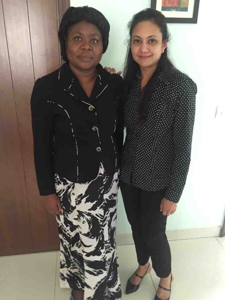 Patient with doctor after successful treatment in India