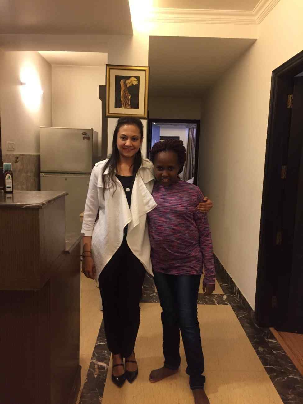 Patient with doctor after successful treatment in India