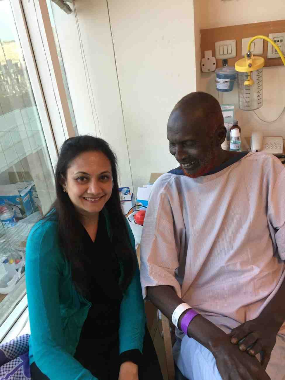 Patient with doctor after successful treatment in India
