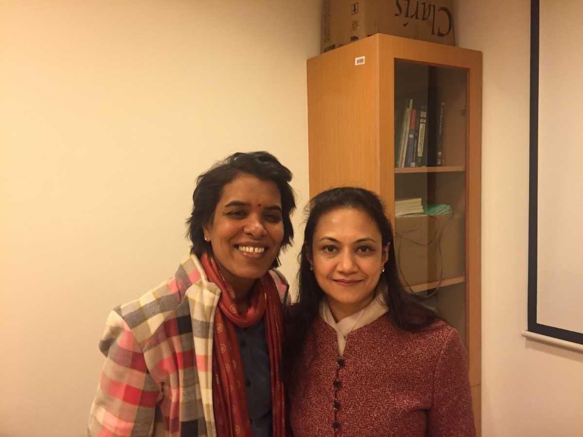 Patient with doctor after successful treatment in India